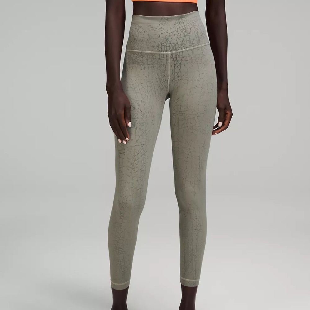 Lululemon Wunder Train High Rise Tight 25" - size 2, Thread Dye Rover Black